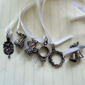 Set of 6 -925 charms. Flower, money bag, baby carriage, ring, wreath, and bells.